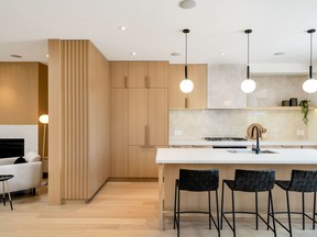 This project by MGB Construction Group Ltd. won the 2022 BILD Renovation Award for Best Kitchen Renovation over $100,000. ROBERT HOLOWKA | BIRD HOUSE MEDIA